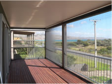 Large clear PVC ziptrak blinds  on sea front